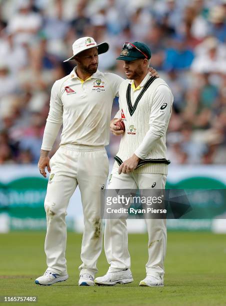 Matthew Wade and David Warner of Australia look during day two of the 1st Specsavers Ashes Test between England and Australia at Edgbaston at...