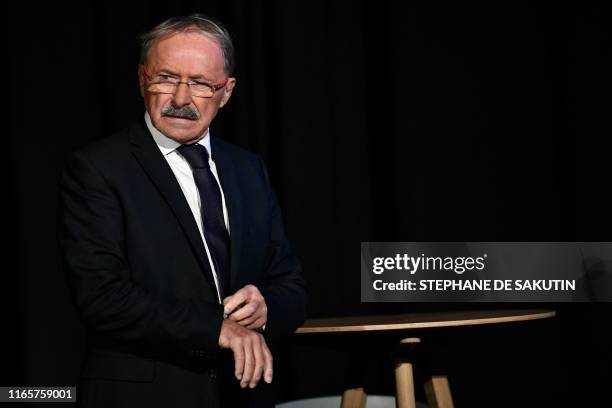 France's head coach Jacques Brunel addresses media representatives during a press conference in the studios of French television channel 'TF1' in...