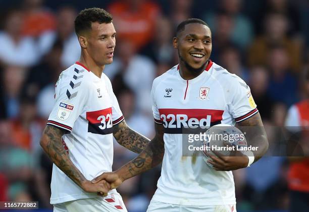 Britt Assombalonga of Middlesborough celebrates with teammate Marvin Johnson after scoring his team's second goal during the Sky Bet Championship...
