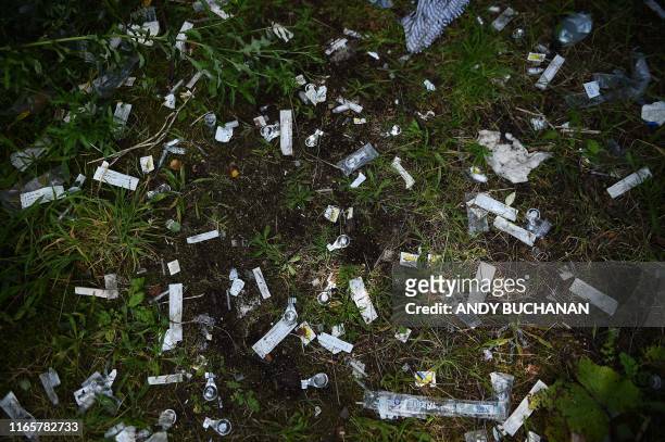Picture shows discarded drug paraphenallia in a small wooded area used by addicts to take drugs near Glasgow city centre, Scotland, on August 15...