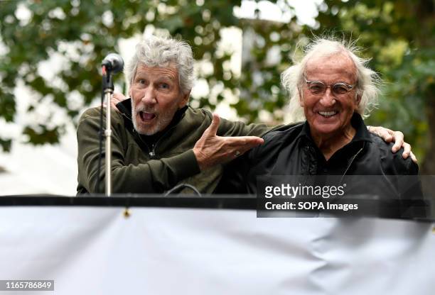 Roger Waters and John Pilger seen during the Don't Extradite Assange rally in London. Julian Assange supporters rally outside the British Home...