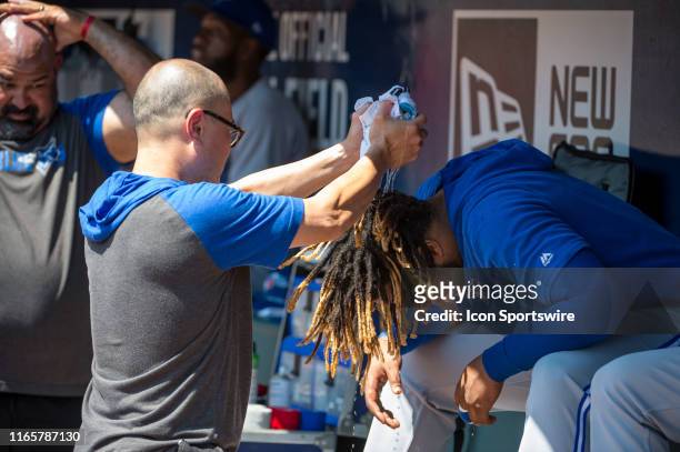 Toronto Blue Jays third baseman Vladimir Guerrero Jr. Cooling down on a hot day in Atlanta during the MLB game between the Atlanta Braves and the...