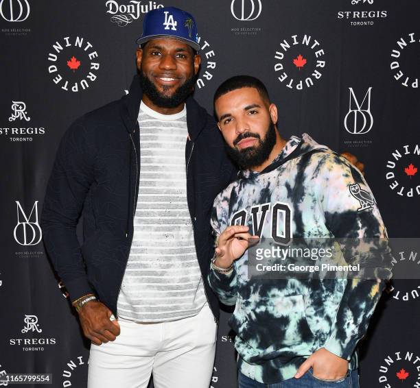 Player Lebron James and Rapper Drake attend the Uninterrupted Canada Launch held at Louis Louis at The St. Regis Toronto on August 02, 2019 in...