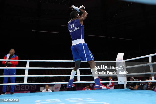 Osvel Caballero of Cuba celebrates after beating Duke Raganof United States during Men's Bantam Final Bout on Day 7 of Lima 2019 Pan American Games...