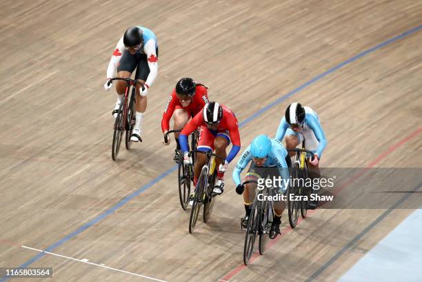 Martha Bayona Pineda of Colombia leads the field on her way to winning the gold medal in the women's keirin at the Velodrome of Villa Deportiva...