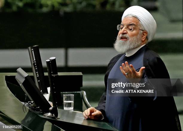 Iran's President Hassan Rouhani addresses parliament in the capital Tehran on September 3, 2019. - In an address to parliament, Rouhani ruled out...