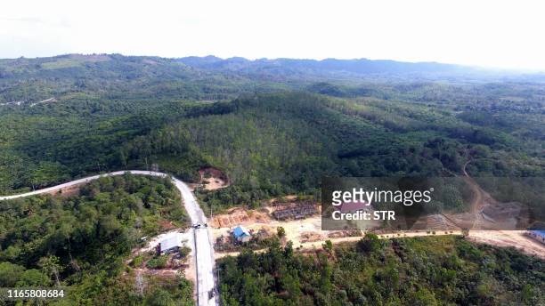 This aerial picture taken on August 28, 2019 shows a view of the area around Sepaku, where Indonesian President Joko Widodo announced that the...