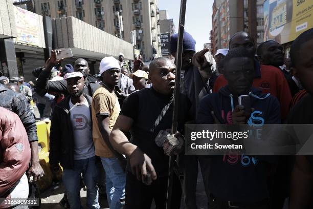 Looting and violence erupts on September 02, 2019 in Johannesburg, South Africa. Shops in and around various parts of Johannesburg, were looted and...