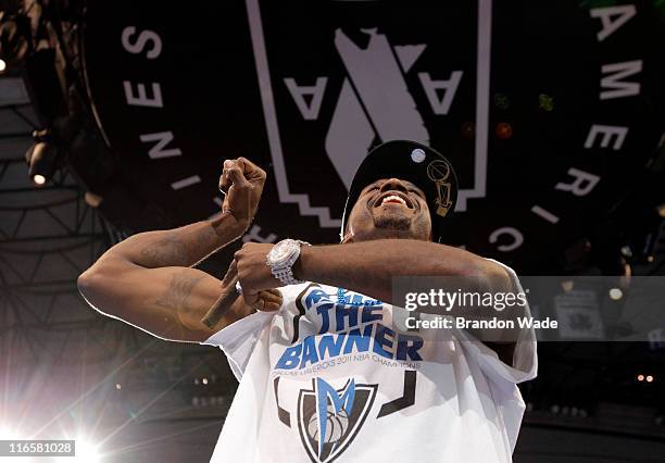 Guard Jason Terry of the Dallas Mavericks shows off his Larry O'Brien Trophy tattoo during the Dallas Mavericks Victory celebration on June 16, 2011...