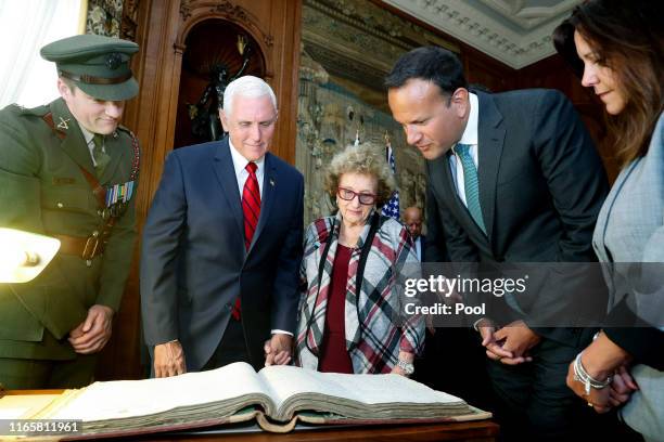 Vice President Mike Pence, Mrs Nancy Pence-Fritsch, Leo Varadkar, An Taoiseach and Second Lady Karen Pence are shown the service records of Pence's...