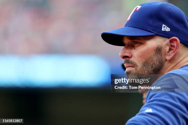 Manager Chris Woodward of the Texas Rangers leads the Texas Rangers against the Detroit Tigersat Globe Life Park in Arlington on August 02, 2019 in...