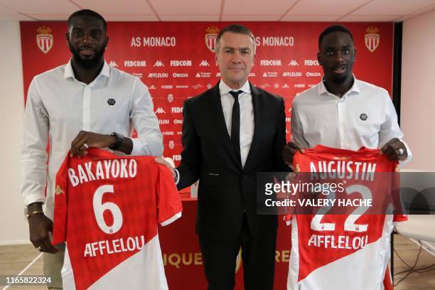 Monaco's Russian Vice club President Oleg Petrov poses after a press conference for the presentation of Monaco's French forward Jean-Kevin Augustin...