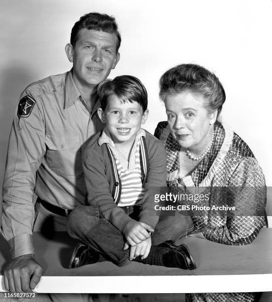 Cast members of the CBS television rural comedy program, The Andy Griffith Show. Pictured from left is Andy Griffith , Ron Howard , Frances Bavier .