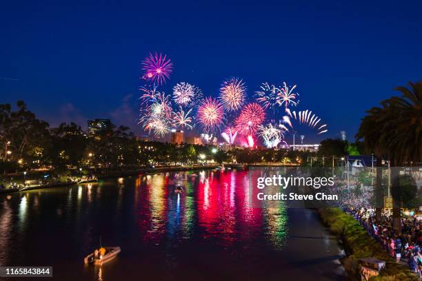 new year fireworks - fireworks stock pictures, royalty-free photos & images