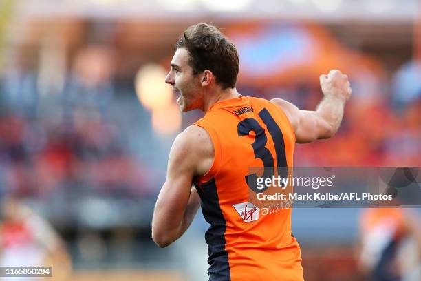 Jeremy Finlayson of the Giants celebrates kicking a goal during the round 20 AFL match between the Greater Western Sydney Giants and the Sydney Swans...