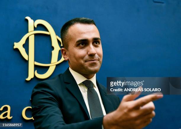 Head of the M5S Five start political movement, outgoing Italys Labor and Industry Minister and deputy PM Luigi Di Maio gestures during a news...