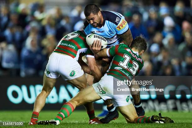 Andrew Fifita of the Sharks is tackled during the round 20 NRL match between the Cronulla Sharks and the South Sydney Rabbitohs at Shark Park on...