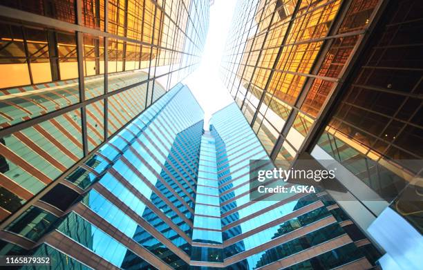 modern skyscrapers in business district - color boost imagens e fotografias de stock