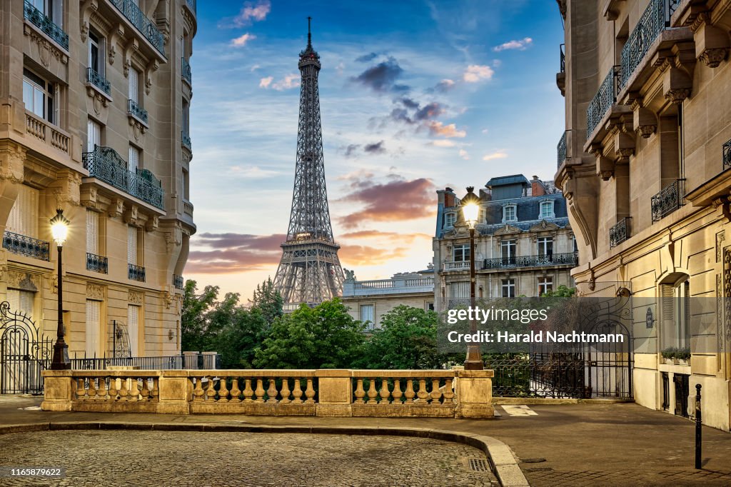 Eiffel Tower with Haussmann apartment Buildings in foreground, Paris, France
