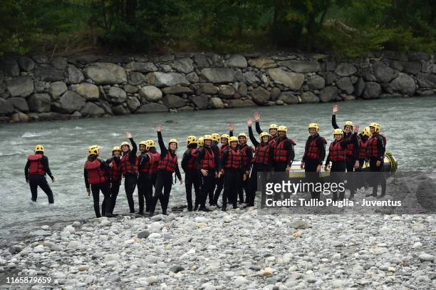 Players of Juventus Women greet during a rafting ride down the Dora Baltea river on August 02, 2019 in Aymavilles near Aosta, Italy.