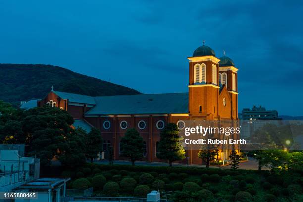 urakami cathedral at dusk - historical geopolitical location stock pictures, royalty-free photos & images