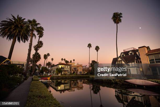 venice in los angeles, canals at sunset - riverside stock pictures, royalty-free photos & images