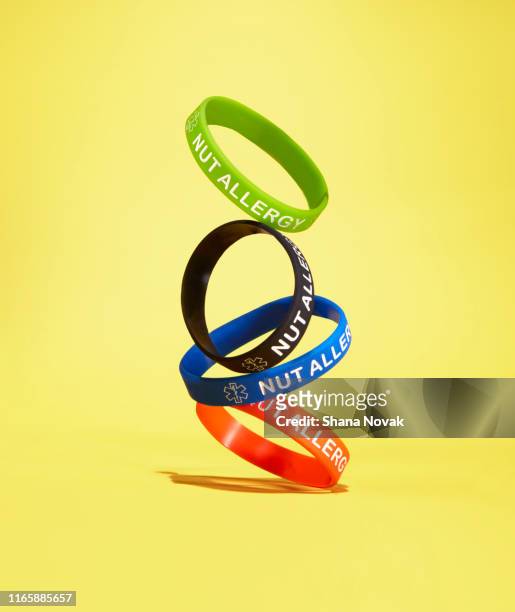 nut allergy awareness bracelet - wristband stock pictures, royalty-free photos & images