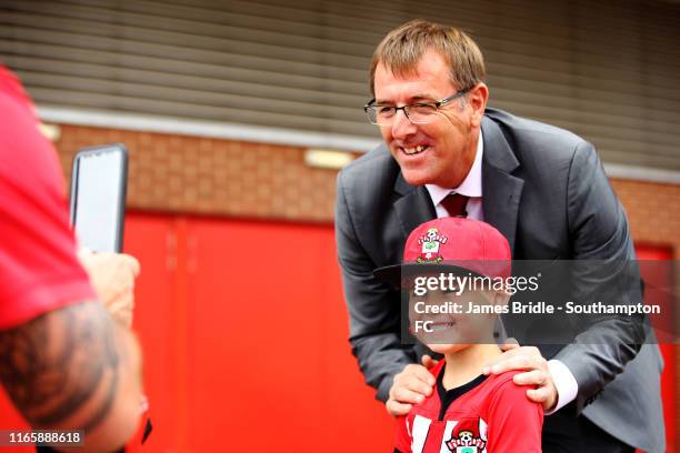 Southampton FC ambassador Matt Le Tissier poses for photos with young fans ahead of the Pre-Season Friendly match between Southampton FC and FC Köln...