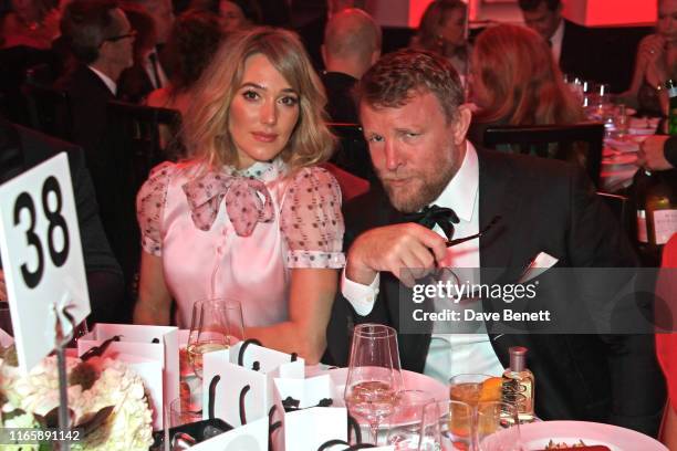 Jacqui Ainsley and Guy Ritchie attend the the GQ Men Of The Year Awards 2019 in association with HUGO BOSS at the Tate Modern on September 3, 2019 in...