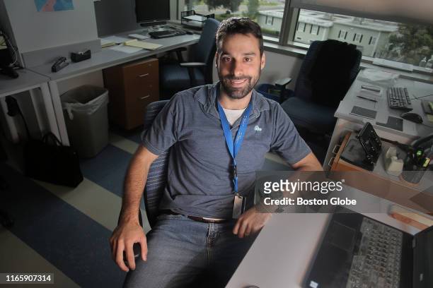 Zack Kennedy poses for a portrait in his lab at the Albert Sherman Center on the UMass Medical School campus in Worcester, MA on Aug. 13, 2019....