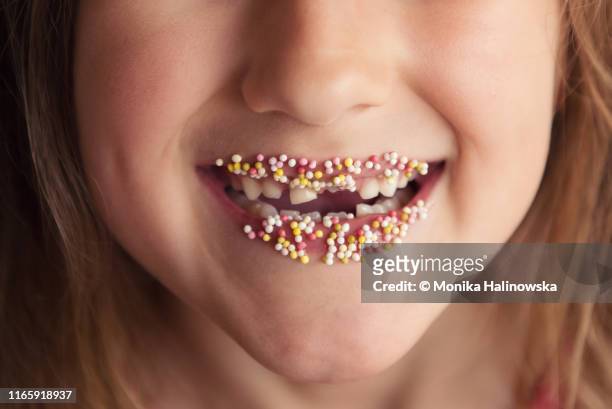 portrait of a gap toothed smiling girl - hundreds and thousands stock pictures, royalty-free photos & images