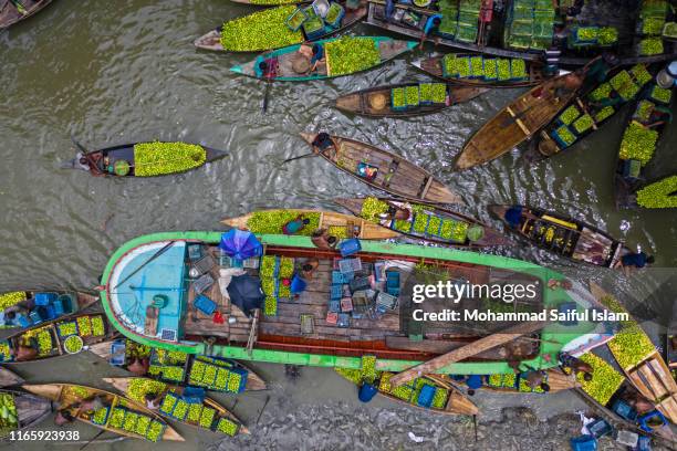 floating guava market in bangladesh - bangladesh business stock pictures, royalty-free photos & images
