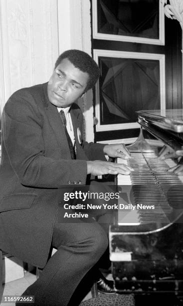 He Must Be Tuning Up For the Wepner Fight... Muhammad Ali does a number on the keyboard at the Plaza, where he received Sport Magazine's Man of the...