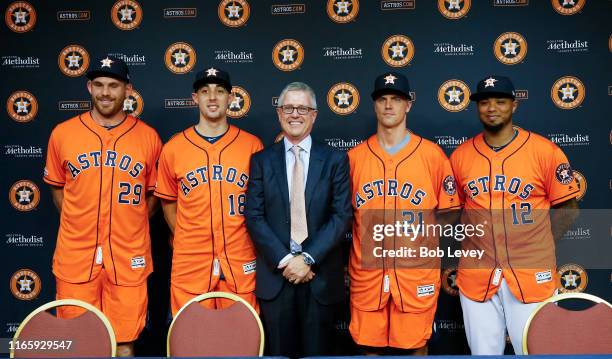 Joe Biagini, Aaron Sanchez, Houston Astros general manager Jeff Luhnow, Zack Grienke and Martin Maldonado of the Houston Astros are introduced during...