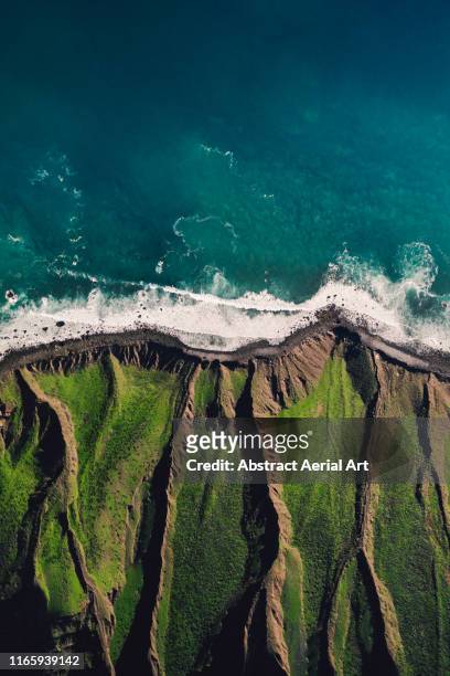 cliff edge and the atlantic ocean taken by drone, lanzarote - landscape nature fotografías e imágenes de stock