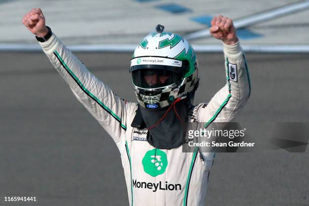 Austin Cindric, driver of the MoneyLion Ford, celebrates after winning the NASCAR Xfinity Series Zippo 200 at The Glen at Watkins Glen International...