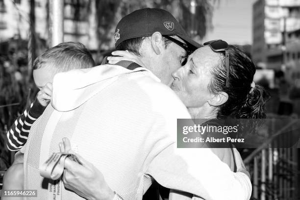 Lisa Weightman celebrates with husband Lachie Weightman after finishing first during the Athletics Australia Half Marathon Championships on August...