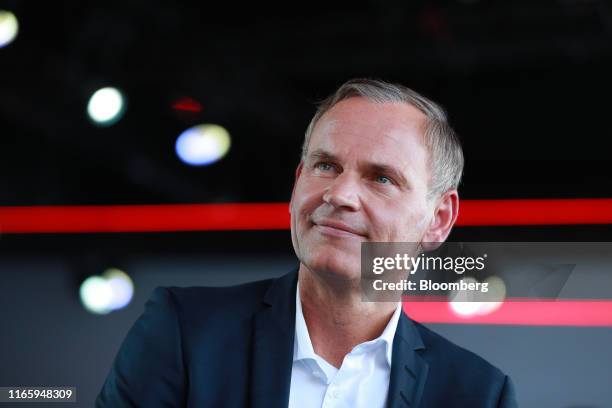 Oliver Blume, chief executive officer of Porsche AG, pauses during a Bloomberg Television interview as the new all electric Porsche AG Taycan luxury...