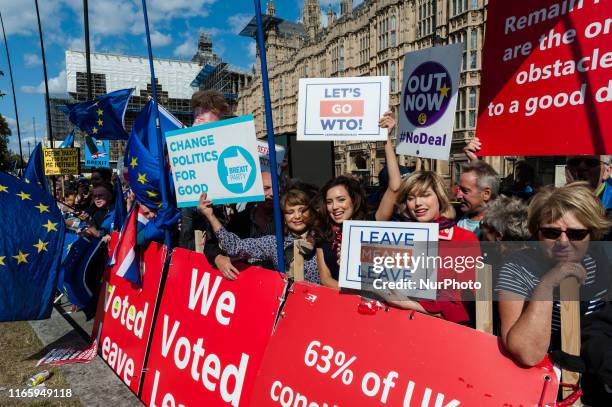 Pro and anti-Brexit demonstrators protest outside the Houses of Parliament in London on 04 September 2019 in London, England. Boris Johnson's...