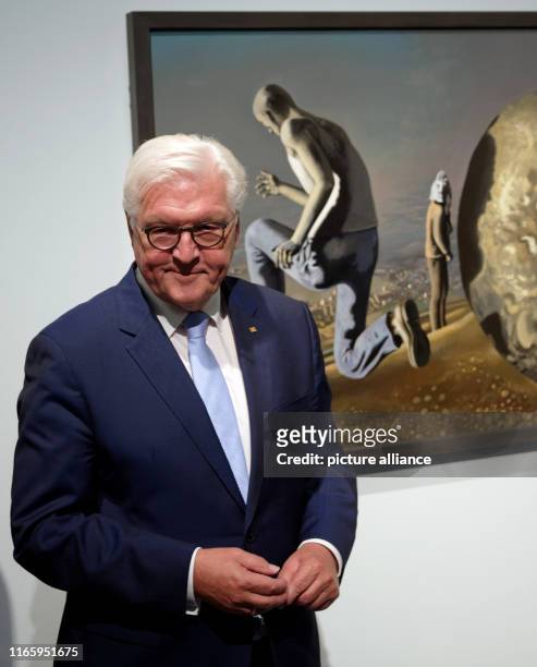 September 2019, North Rhine-Westphalia, Duesseldorf: Federal President Frank-Walter Steinmeier stands at the opening of the exhibition "Utopia and...