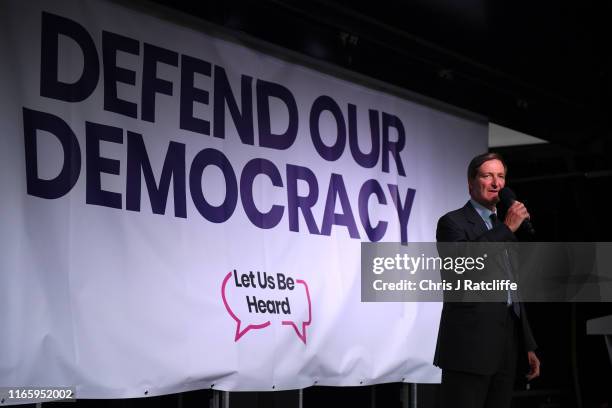 Expelled Conservative MP Dominic Grieve talks onstage at a 'Let Us Be Heard' rally as Pro-remain supporters gather in Westminster on September 4,...
