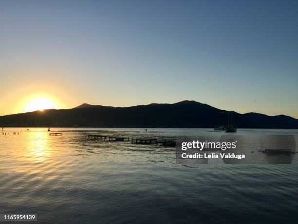 the beauty of the sunset in conceição lagoon - florianopolis stock-fotos und bilder