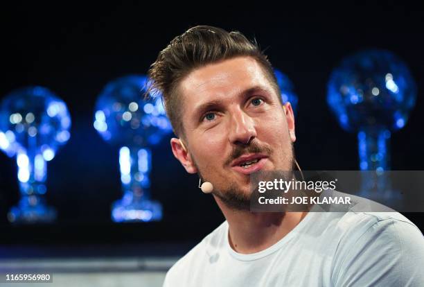 Austrian World Cup alpine ski racer Marcel Hirscher speaks during an annoucement in Salzburg, Austria on September 4, 2019. - Alpine skiing champion...