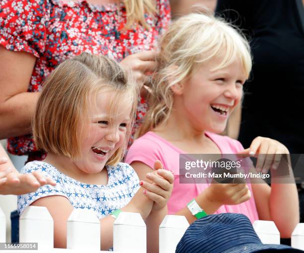 Mia Tindall and Isla Phillips cheer as they watch the Shetland Pony Grand National on day 2 of the 2019 Festival of British Eventing at Gatcombe Park...