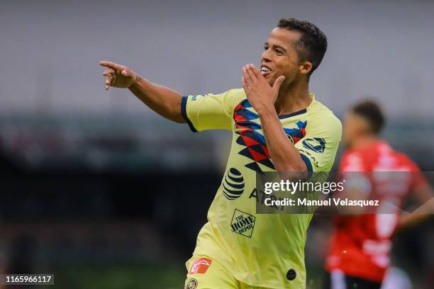 Giovani Dos Santos of America celebrates the third scored goal during the 3rd round match between America and Tijuana as part of the Torneo Apertura...