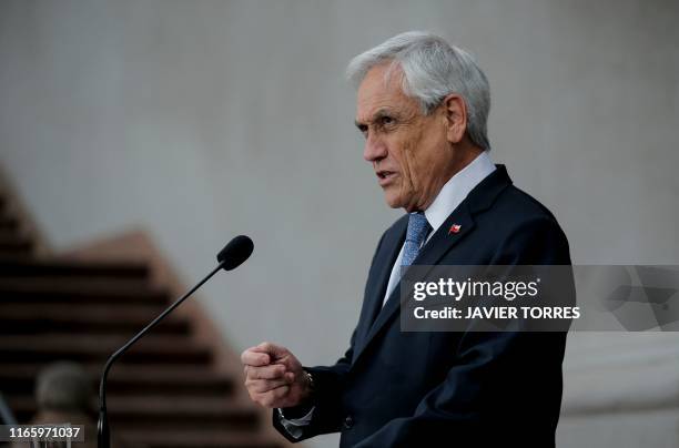 Chilean president Sebastian Pinera speaks during a press conference at La Moneda Presidential Palace in Santiago on September 04, 2019. - Chile's...