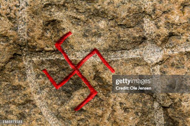 Detail of a rune stone with symbols from 700 800 A.D. At Lejre outdoor museum, Land of Legends, on September 03, 2019 in Lejre, Denmark. This is a...