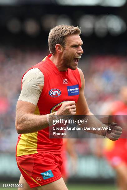 Sam Day of the Suns celebrates kicking a goal during the round 20 AFL match between the Collingwood Magpies and the Gold Coast Suns at Melbourne...