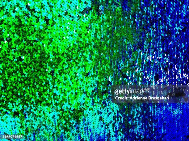 blue and green sequins surface - bling bling stock pictures, royalty-free photos & images