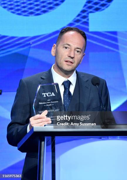 Jules Cornell accepts the Outstanding Achievement in News and Information Award for "Leaving Neverland" onstage during the TCA Awards at The Beverly...